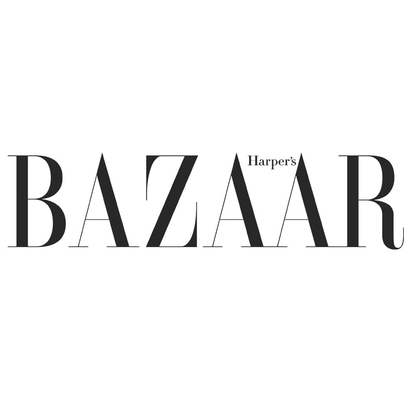 Harper's Bazaar feature article about Jane Bartel Jewelry. Summer chic for 2021 handcrafted spiral gold hoop earrings set with white diamonds inspired by the waves. Crafted by hand with recycled 14k gold and recycled diamonds in New York City.
