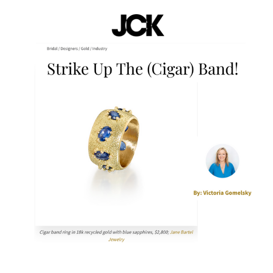 Gold and sapphire wide band ring by Jane Bartel Jewelry featured in JCK magazine