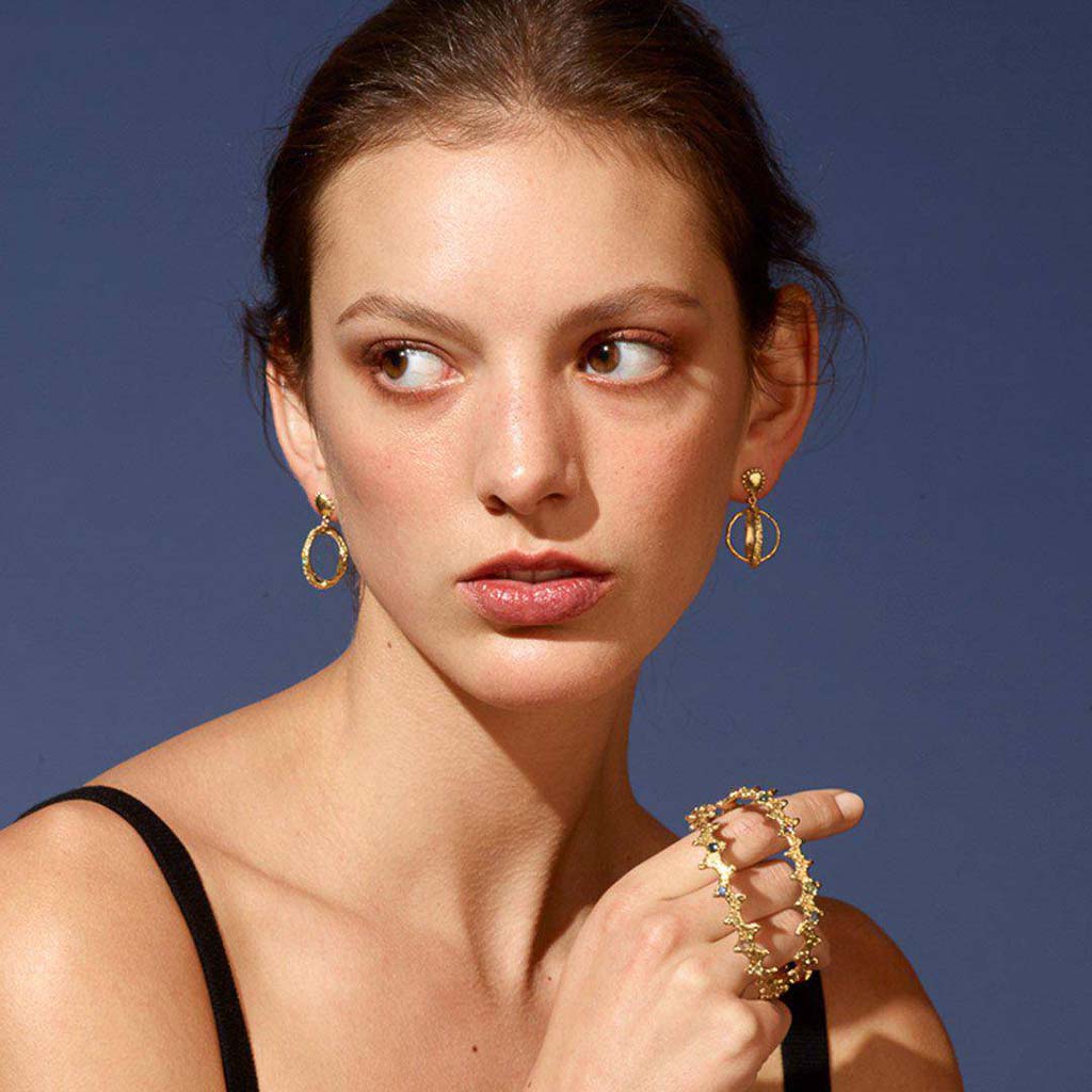 18k gold and diamond dangle circle earrings by Jane Bartel