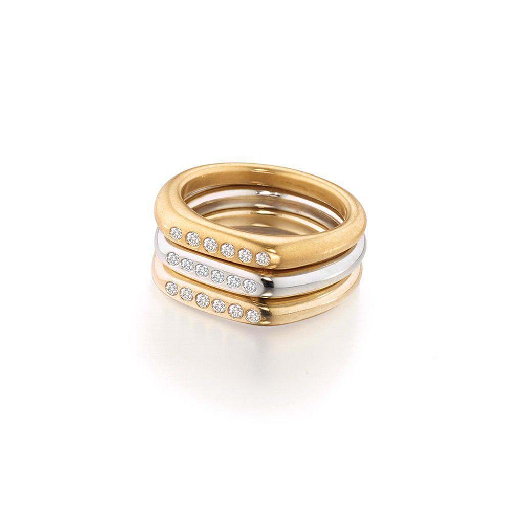 minimal gold and diamond stacking rings by Jane Bartel Jewlelry