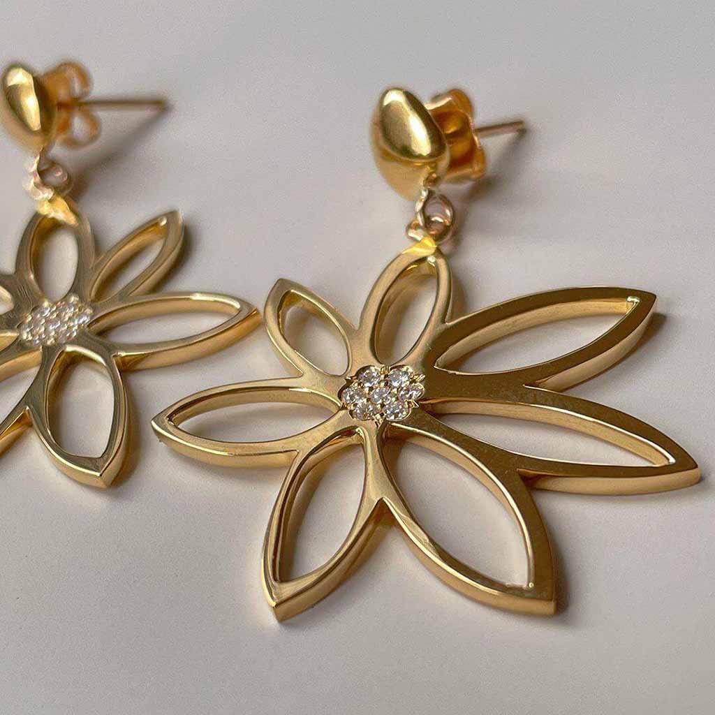 18k gold dangle flower earrings with pave set diamonds by Jane Bartel