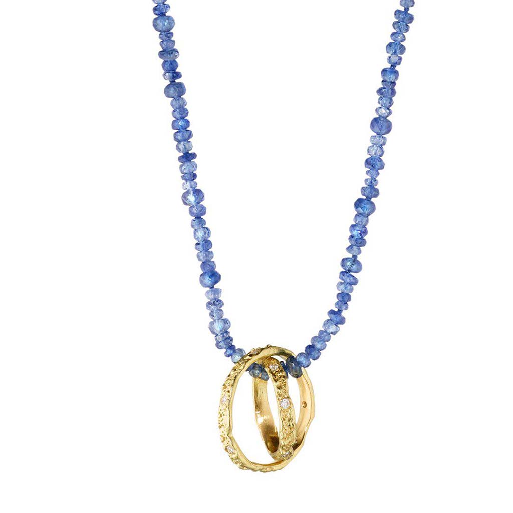 long 18k gold and blue sapphire circle of love necklace by Jane Bartel
