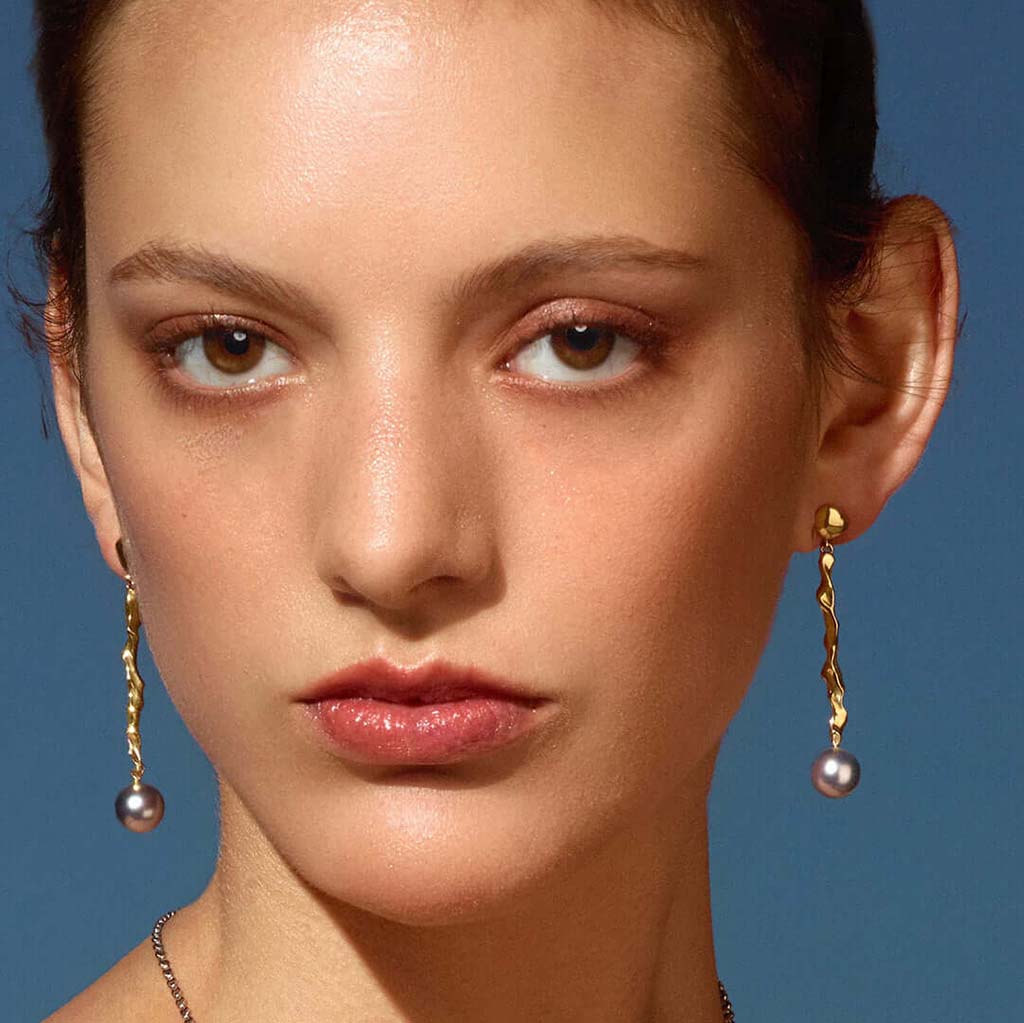 elegant, long 18k gold and tahitian pearl dangle earrings by Jane Bartel