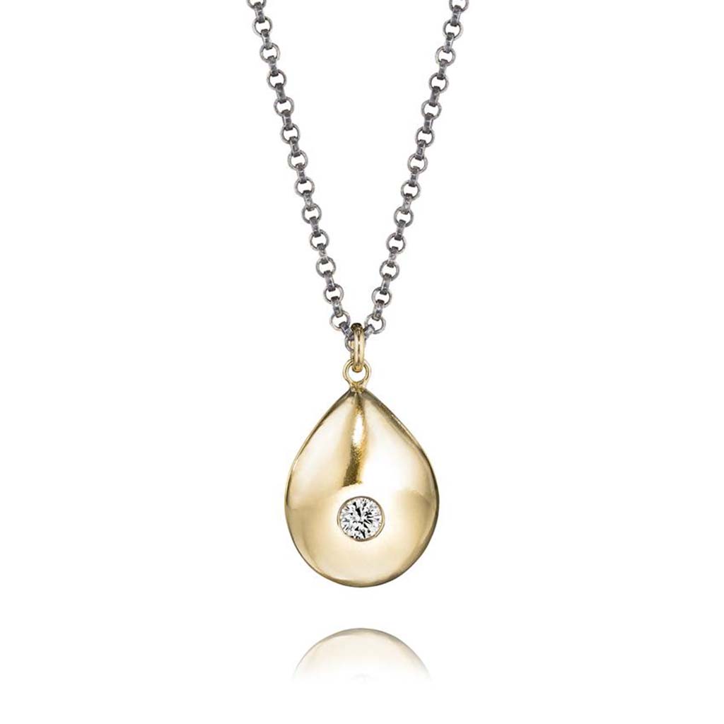 teardrop necklace in 14k gold set with a 3mm diamond on a sterling silver chain by Jane Bartel